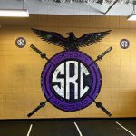 Branded wall graphics to enhance gym atmosphere and identity