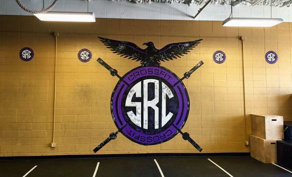 Branded wall graphics to enhance gym atmosphere and identity