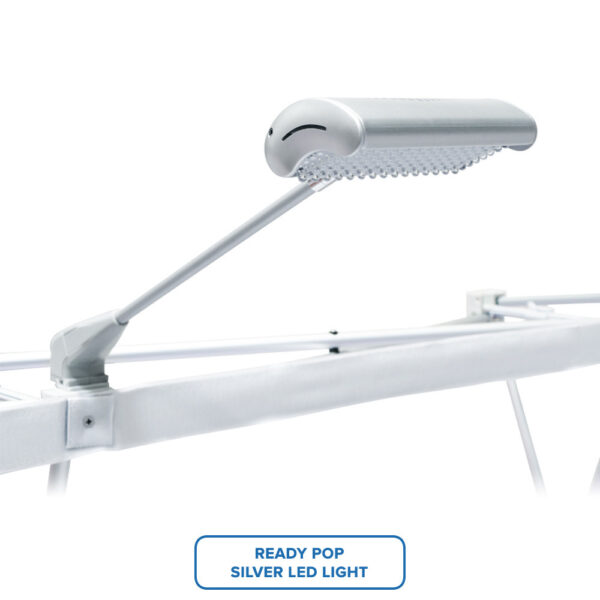 Silver LED light mounted on a white pop-up display frame.