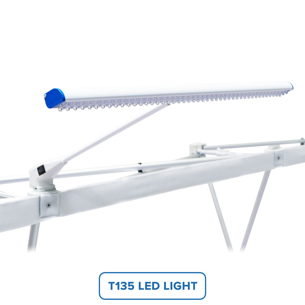 Mounted T135 LED light illuminating USAW backdrop frame.