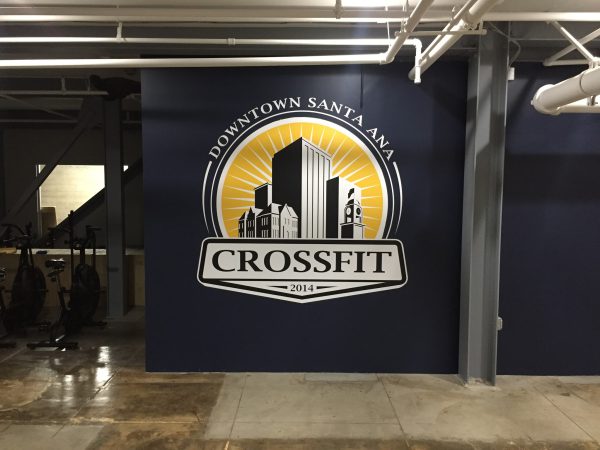 Custom gym wall decals for branding and motivational messaging