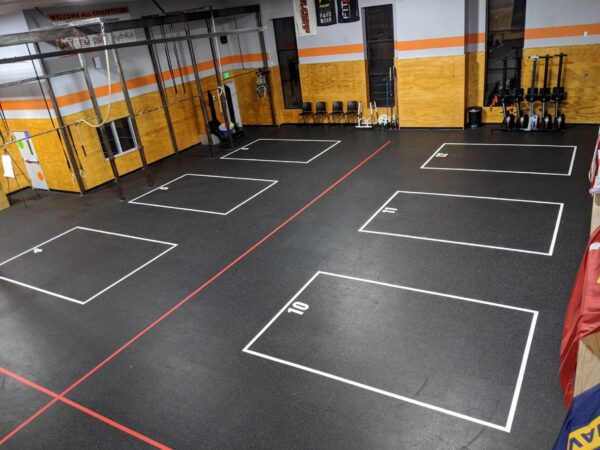 Durable floor grid decals for gym distancing and safety