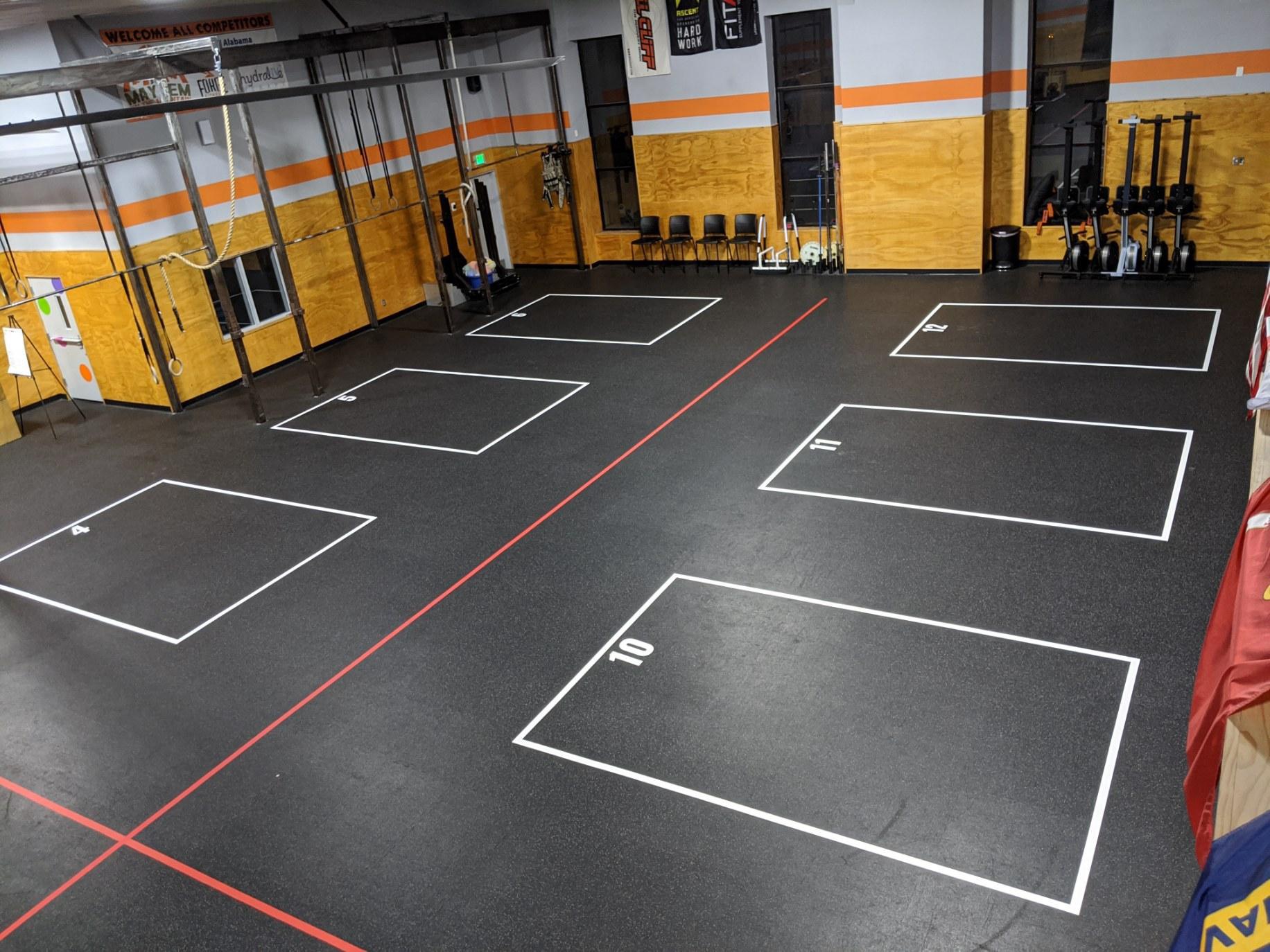 Durable floor grid decals for gym distancing and safety