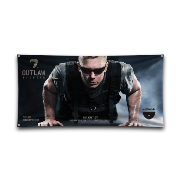Outlaw Eyewear banner featuring athlete in tactical gear and sunglasses