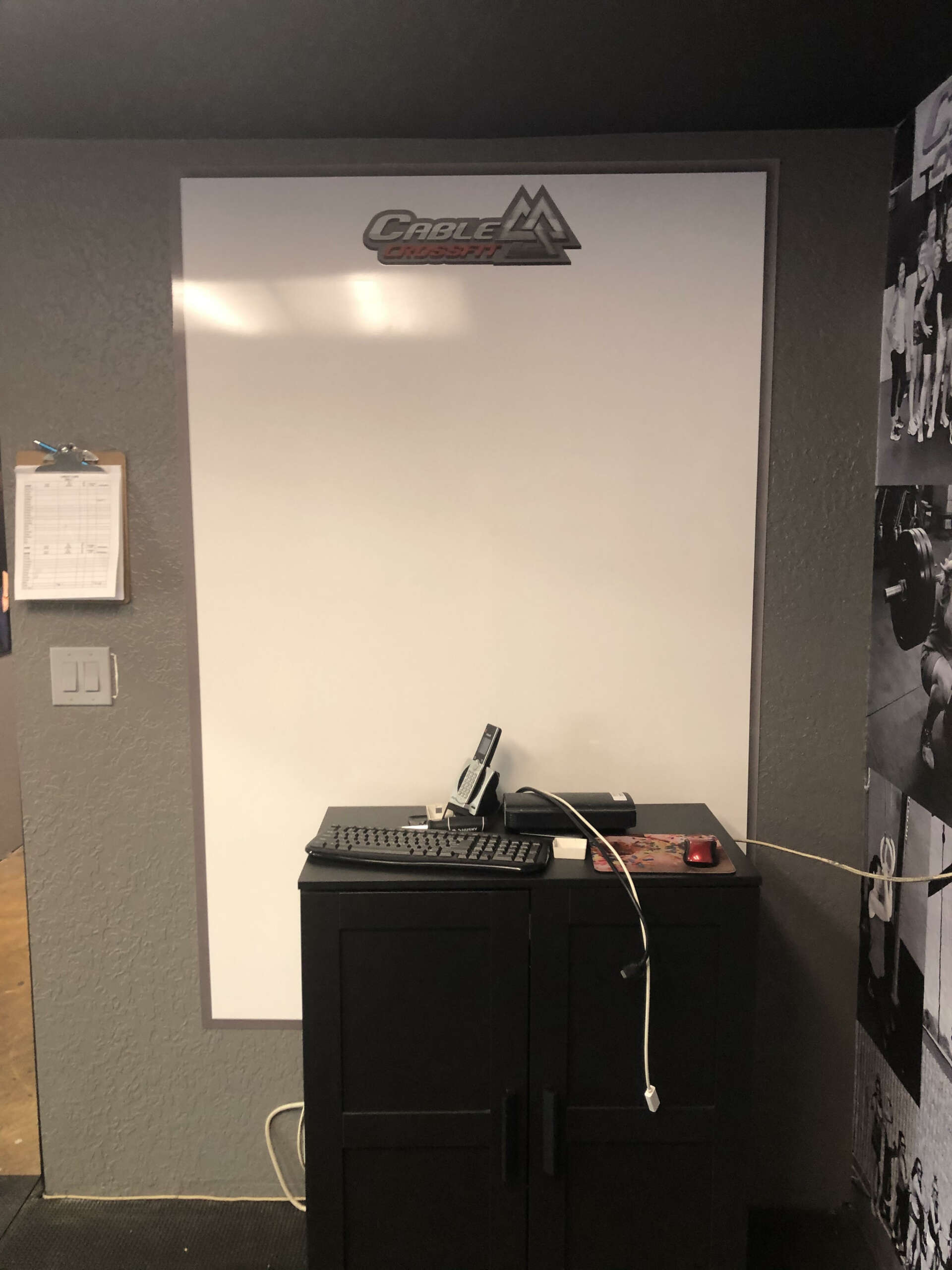 Custom dry erase board for CrossFit gym programming and notes