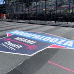 Wodapalooza CrossFit Festival floor decal at outdoor competition arena in Miami.