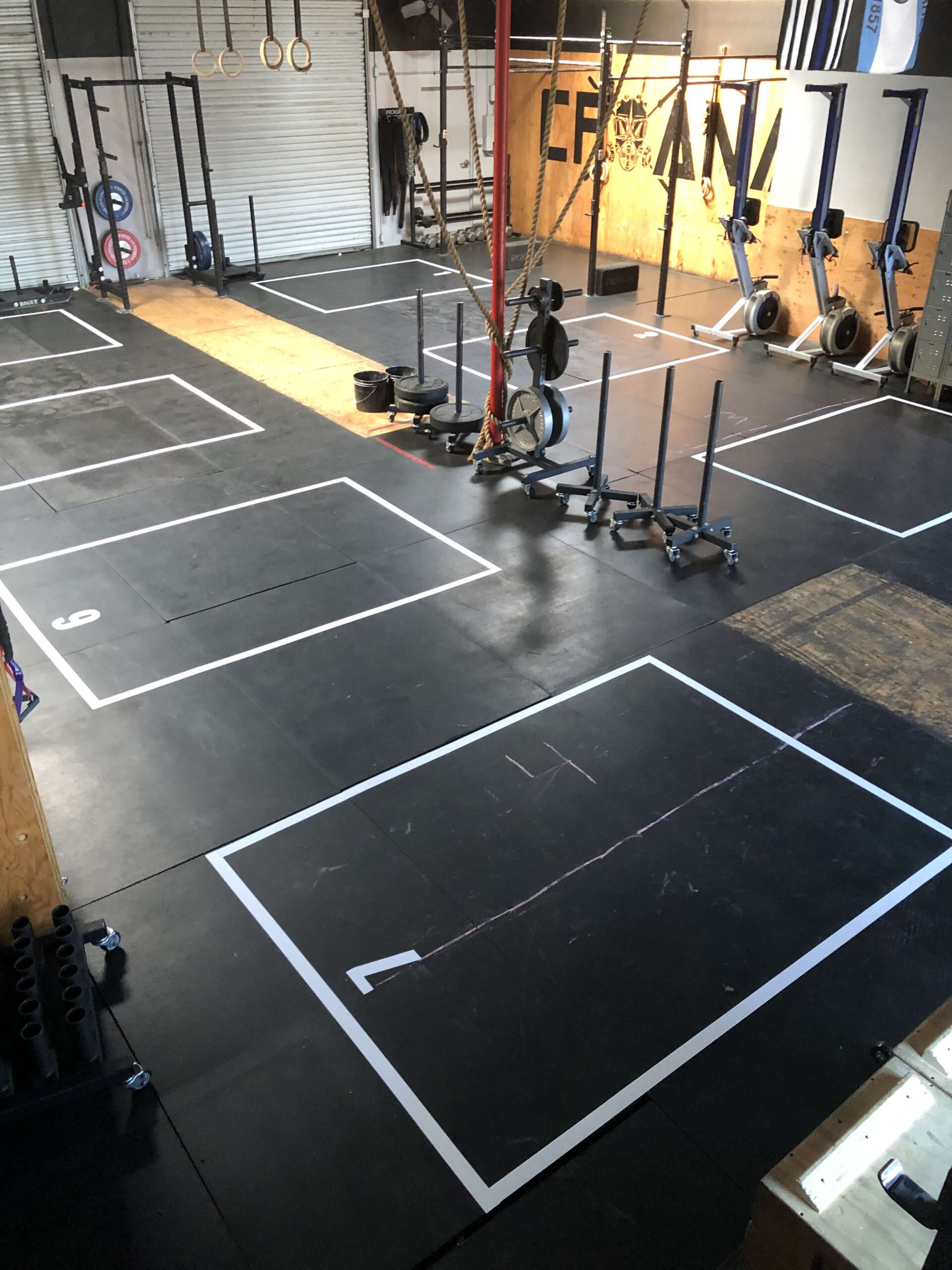 Durable floor grid decals for gym distancing and safety