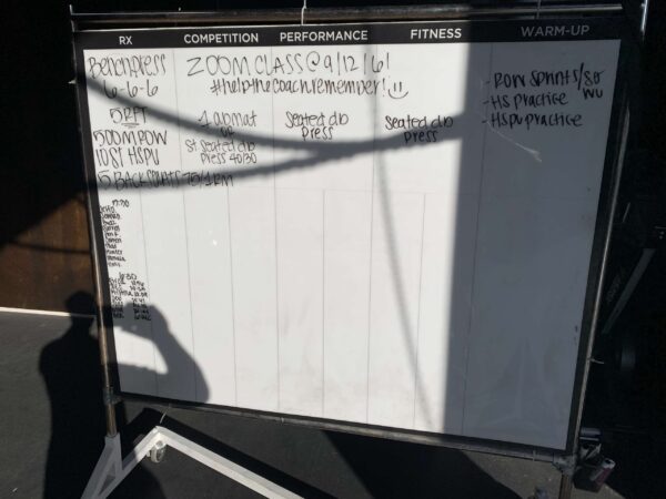 Custom dry erase board for CrossFit gym programming and notes