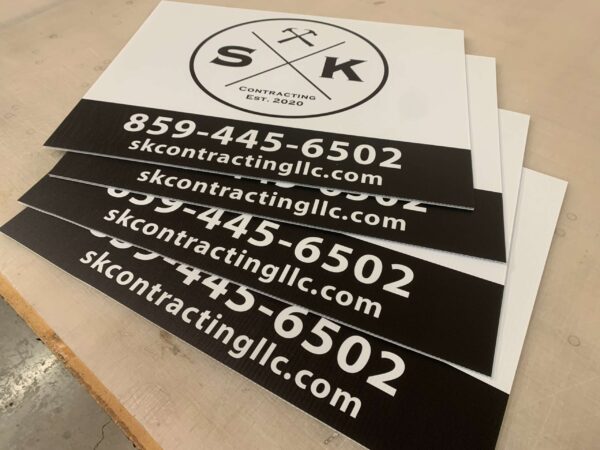 Full-color printed coroplast sign with bold promotional text