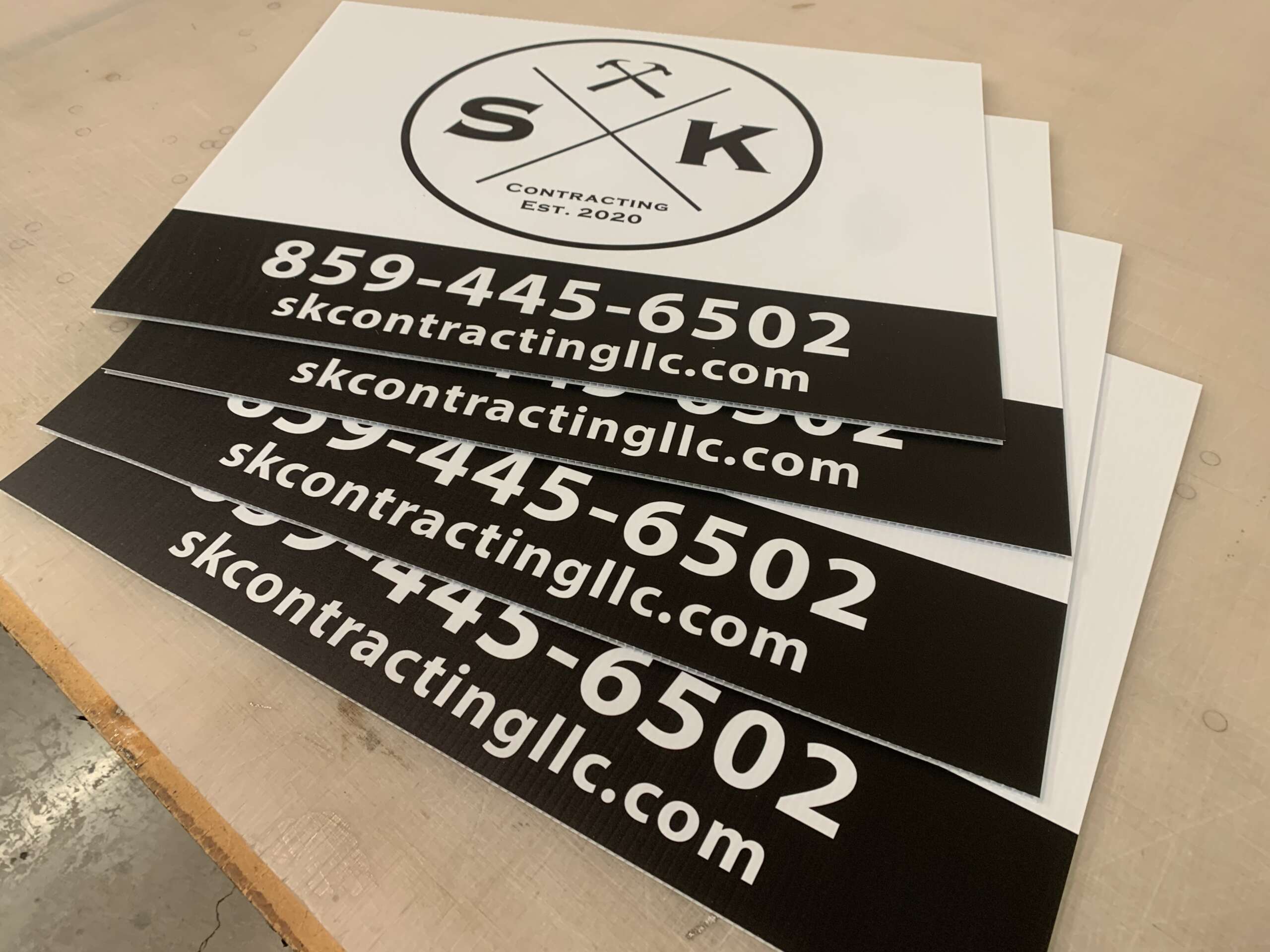 Full-color printed coroplast sign with bold promotional text