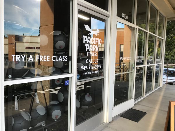 Custom fitness window graphics to promote services and attract members