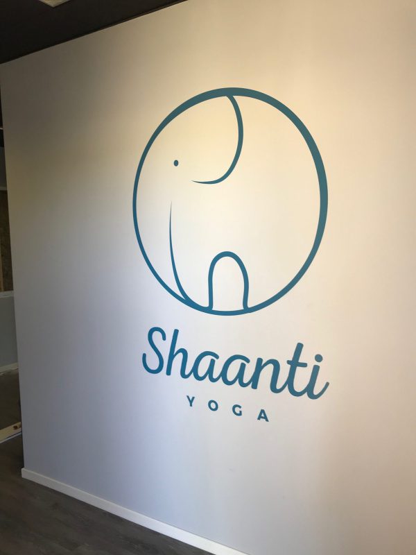 Custom gym wall decals for branding and motivational messaging