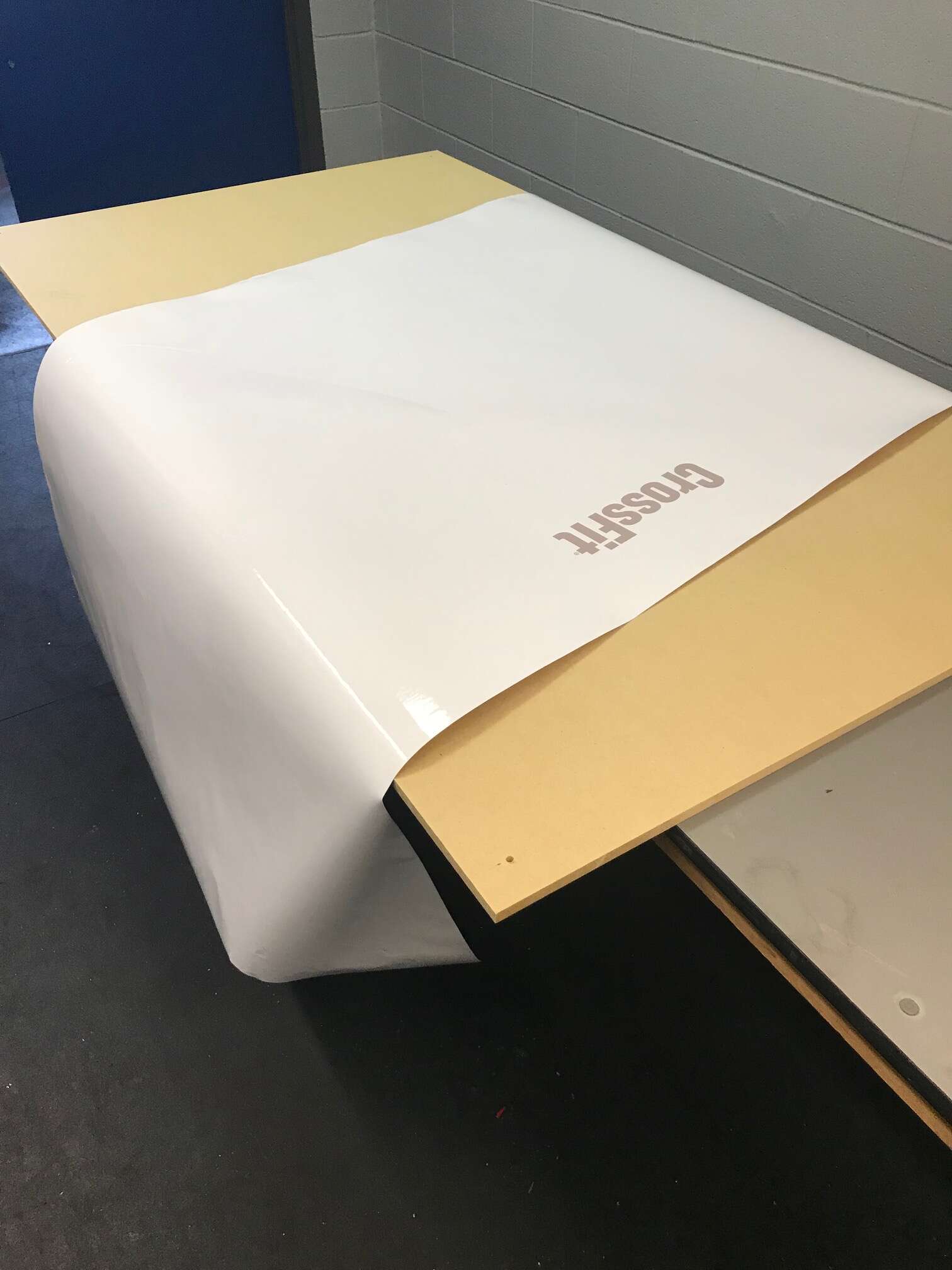 Custom dry erase board for CrossFit gym programming and notes