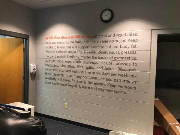 Custom gym wall decals for branding and motivational messaging