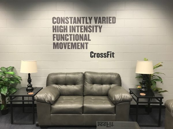 Custom gym wall decals for branding and motivational messaging