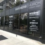 Custom window decals for business branding and storefront promotions