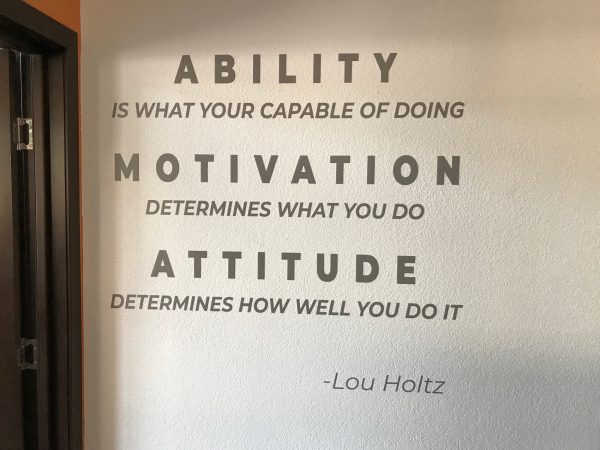 Custom gym wall decals for branding and motivational messaging