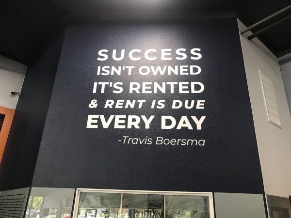 Custom gym wall decals for branding and motivational messaging