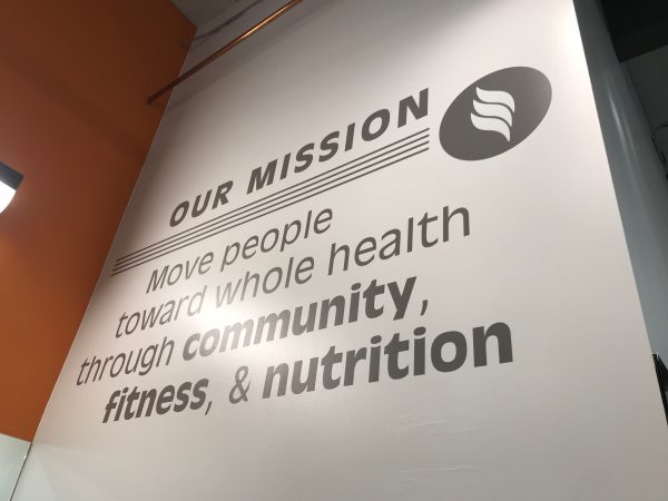 Custom gym wall decals for branding and motivational messaging