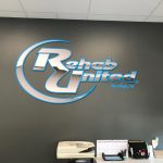Custom gym wall decals for branding and motivational messaging