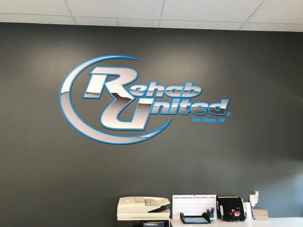 Custom gym wall decals for branding and motivational messaging
