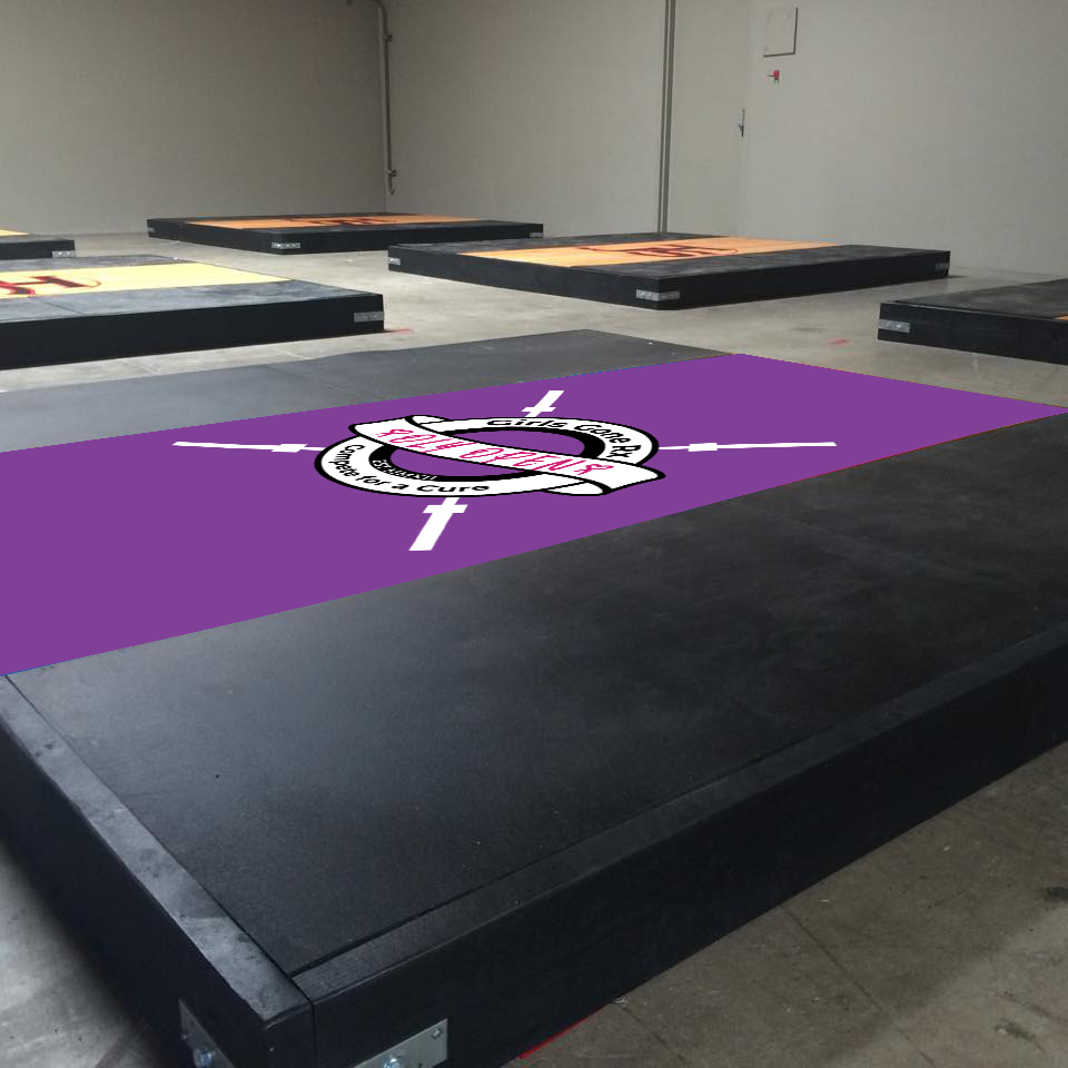 Custom GGRX platform cover with gym branding and design accents