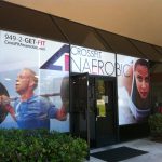 CrossFit Anaerobic gym exterior with large branded window graphics.