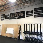 Custom gym wall decals for branding and motivational messaging