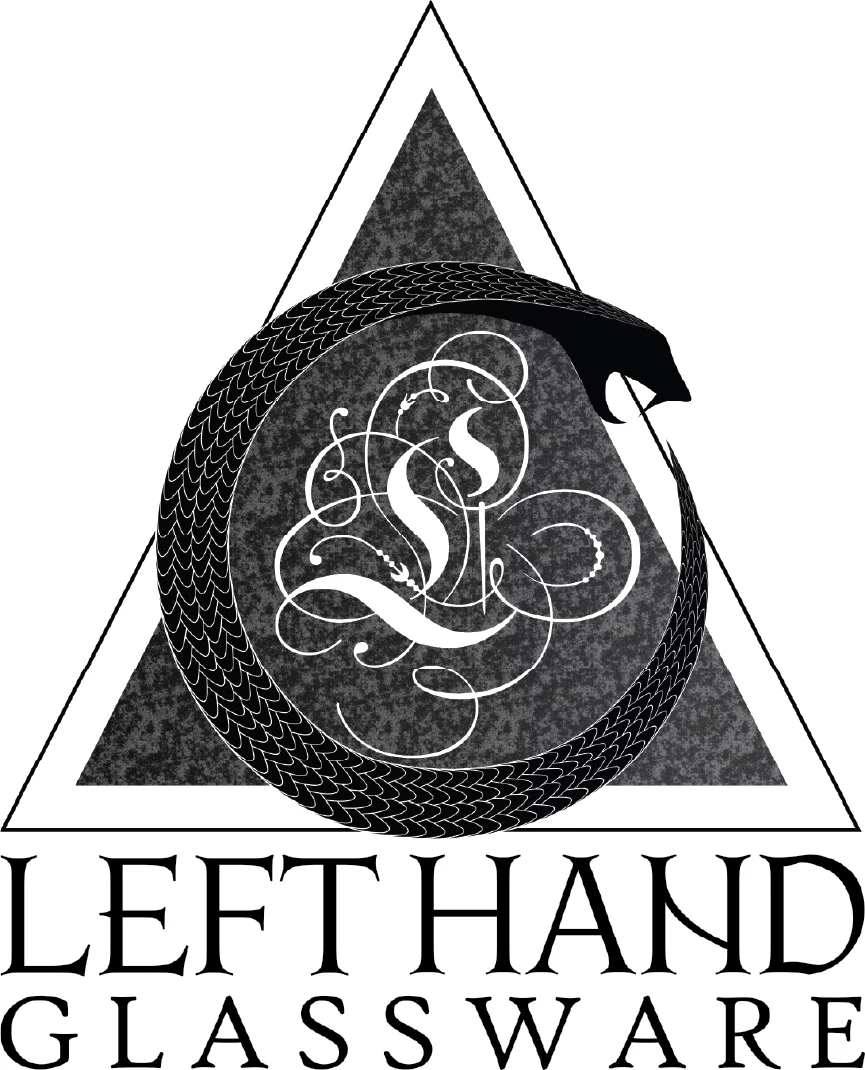 Left Hand Glassware logo featuring snake circle and ornate monogram