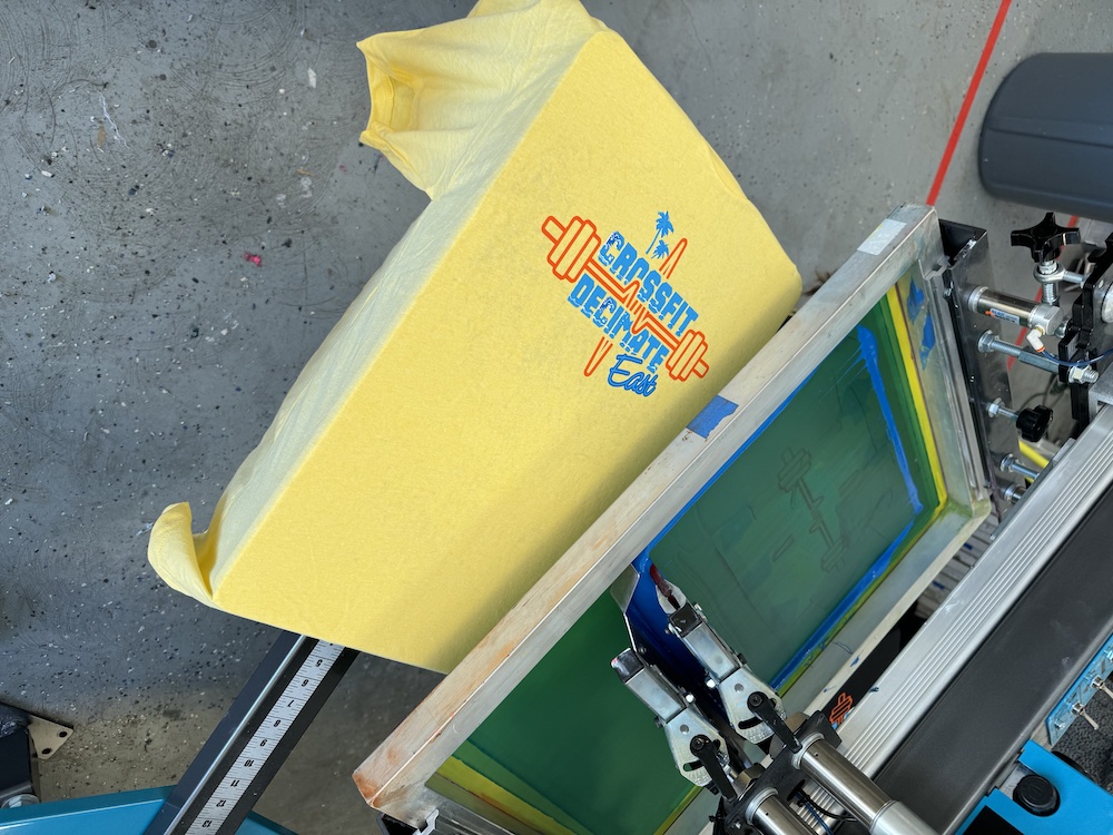 Custom printed gym apparel with top brands and plastisol screen printing