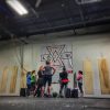 Custom 13 oz vinyl banner displaying gym branding and messaging