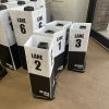 Customizable delineator covers for improved visibility and branding at events
