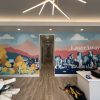 Custom wall murals for gyms, offices, or retail, with vibrant colors and branded designs.