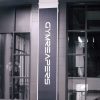 Repositionable adhesive fabric for smooth wall and glass application